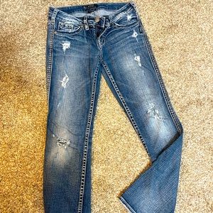 Silver jeans. Distressed.